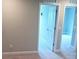 Neutral-toned bedroom with views to another room at 1867 Holden Ridge Lane, Clermont, FL 34715