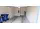 Spacious two car garage with bright lighting at 1867 Holden Ridge Lane, Clermont, FL 34715