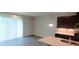 Bright living space featuring open layout with a modern kitchen at 1867 Holden Ridge Lane, Clermont, FL 34715
