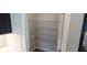 Walk-in pantry with wire shelving for organized storage at 1867 Holden Ridge Lane, Clermont, FL 34715