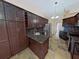 Elegant kitchen with granite countertops, stainless steel appliances, and plenty of cabinet space at 2947 Aldrich St, Eustis, FL 32726