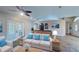 Spacious living room with tile floors, neutral walls, and lots of natural light at 2947 Aldrich St, Eustis, FL 32726