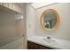 Bathroom featuring a tiled shower/tub and vanity area with sink at 9335 Silver Lake Dr, Leesburg, FL 34788