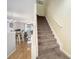 View of the staircase and open-concept living spaces from the entryway at 4904 Sw 45Th St, Ocala, FL 34474