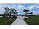 Walking path in community park featuring picnic areas and landscaping at 2290 Raven Ridge Rd, Minneola, FL 34715