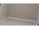 Empty laundry room with light wood floor, utility hookups, and neutral walls at 2290 Raven Ridge Rd, Minneola, FL 34715