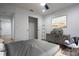Staged bedroom with a walk-in closet and industrial design and decor at 700 Fisher Rd, Ocklawaha, FL 32179