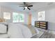 Cozy bedroom with natural light and a view of the outdoors at 781 Ne 130Th Ter, Silver Springs, FL 34488