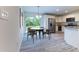 Eat-in kitchen area featuring stainless steel appliances and a view of the backyard at 781 Ne 130Th Ter, Silver Springs, FL 34488