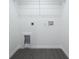 Laundry room with laminate flooring and hookups ready for a washer and dryer at 781 Ne 130Th Ter, Silver Springs, FL 34488
