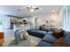 Open-concept living area with modern decor and kitchen view at 781 Ne 130Th Ter, Silver Springs, FL 34488