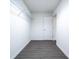 Spacious walk-in closet featuring built-in shelving for organized storage at 781 Ne 130Th Ter, Silver Springs, FL 34488