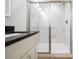 Modern bathroom features a glass-enclosed shower with decorative tile at 13050 Ne 7Th Loop, Silver Springs, FL 34488