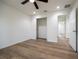 Bedroom with new floors features a closet, modern ceiling fan, and recessed lighting at 13050 Ne 7Th Loop, Silver Springs, FL 34488