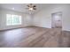 Open-concept kitchen featuring an island, stainless appliances, and sleek countertops at 13050 Ne 7Th Loop, Silver Springs, FL 34488