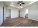 Spacious main bedroom featuring a tray ceiling and ensuite bathroom at 13050 Ne 7Th Loop, Silver Springs, FL 34488