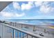 Breathtaking ocean view from condo balcony overlooking a pool and sandy beach at 89 S Atlantic Ave # 204, Ormond Beach, FL 32176