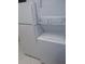 White stackable washer and dryer are in the laundry room at 89 S Atlantic Ave # 204, Ormond Beach, FL 32176