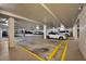 Secure parking garage with designated parking spots at 89 S Atlantic Ave # 204, Ormond Beach, FL 32176