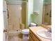 Bathroom with shower stall, toilet and sink at 10730 Se 50Th Ave, Belleview, FL 34420