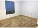 Bright bedroom with neutral walls and carpeted floor at 10730 Se 50Th Ave, Belleview, FL 34420