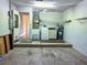 Garage with washer, dryer and extra storage at 10730 Se 50Th Ave, Belleview, FL 34420