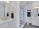 Bright bathroom with double sinks, glass shower, and modern fixtures at 14 Ocean Palm Villa S # 14, Flagler Beach, FL 32136