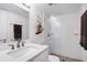 Modern bathroom with glass shower, stylish fixtures, and unique bird art at 14 Ocean Palm Villa S # 14, Flagler Beach, FL 32136
