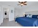 Comfortable main bedroom with an en-suite bathroom featuring bright white walls at 14 Ocean Palm Villa S # 14, Flagler Beach, FL 32136