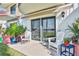 Cozy outdoor patio space with two chairs and views of the water at 14 Ocean Palm Villa S # 14, Flagler Beach, FL 32136