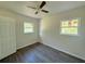 Bedroom with wood-look floors and ceiling fan at 930 Nw 6Th Terrace Ter, Ocala, FL 34475