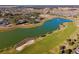 Aerial view of Stone Creek golf course and community lake at 6043 Sw 93Rd Cir, Ocala, FL 34481