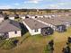 Aerial view of houses with backyard screened porches at 6043 Sw 93Rd Cir, Ocala, FL 34481