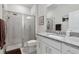 Main bathroom with shower and granite countertop vanity at 6043 Sw 93Rd Cir, Ocala, FL 34481