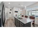 Modern kitchen with island and stainless steel appliances at 6043 Sw 93Rd Cir, Ocala, FL 34481