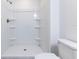 White shower stall with multiple shelves at 8873 Sw 139Th Place Rd, Ocala, FL 34473