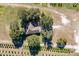 An aerial view of the home surrounded by lush greenery at 16385 Nw 112Th Ct, Reddick, FL 32686