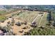 Aerial view of a large property with numerous trees at 16385 Nw 112Th Ct, Reddick, FL 32686