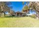 House with covered patio and spacious backyard at 16385 Nw 112Th Ct, Reddick, FL 32686