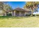 House with covered patio and spacious backyard at 16385 Nw 112Th Ct, Reddick, FL 32686