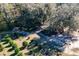 Aerial view of farm equipment under a covered shelter at 16385 Nw 112Th Ct, Reddick, FL 32686