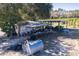 Aerial view of a farm shed with various equipment and storage at 16385 Nw 112Th Ct, Reddick, FL 32686
