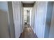 Hallway with doors to bedrooms and bathroom at 16385 Nw 112Th Ct, Reddick, FL 32686