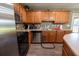 Modern kitchen with stainless steel appliances at 16385 Nw 112Th Ct, Reddick, FL 32686