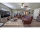 Relaxing living room featuring a large sectional sofa at 16385 Nw 112Th Ct, Reddick, FL 32686