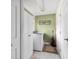 Laundry room with washer, dryer, and ample cabinet space at 5315 Nw 25Th Loop, Ocala, FL 34482