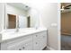 Double vanity bathroom with white cabinets and quartz countertops at 5919 Sw 124Th Terrace Rd, Ocala, FL 34481