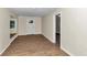 Light-filled living room with hardwood floors at 2605 W Silver Springs Blvd, Ocala, FL 34475