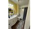 Bathroom with white vanity and a bathtub at 11001 Se Sunset Harbor Rd # B09, Summerfield, FL 34491