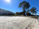 Private sandy beach access with lakefront property at 11001 Se Sunset Harbor Rd # B09, Summerfield, FL 34491